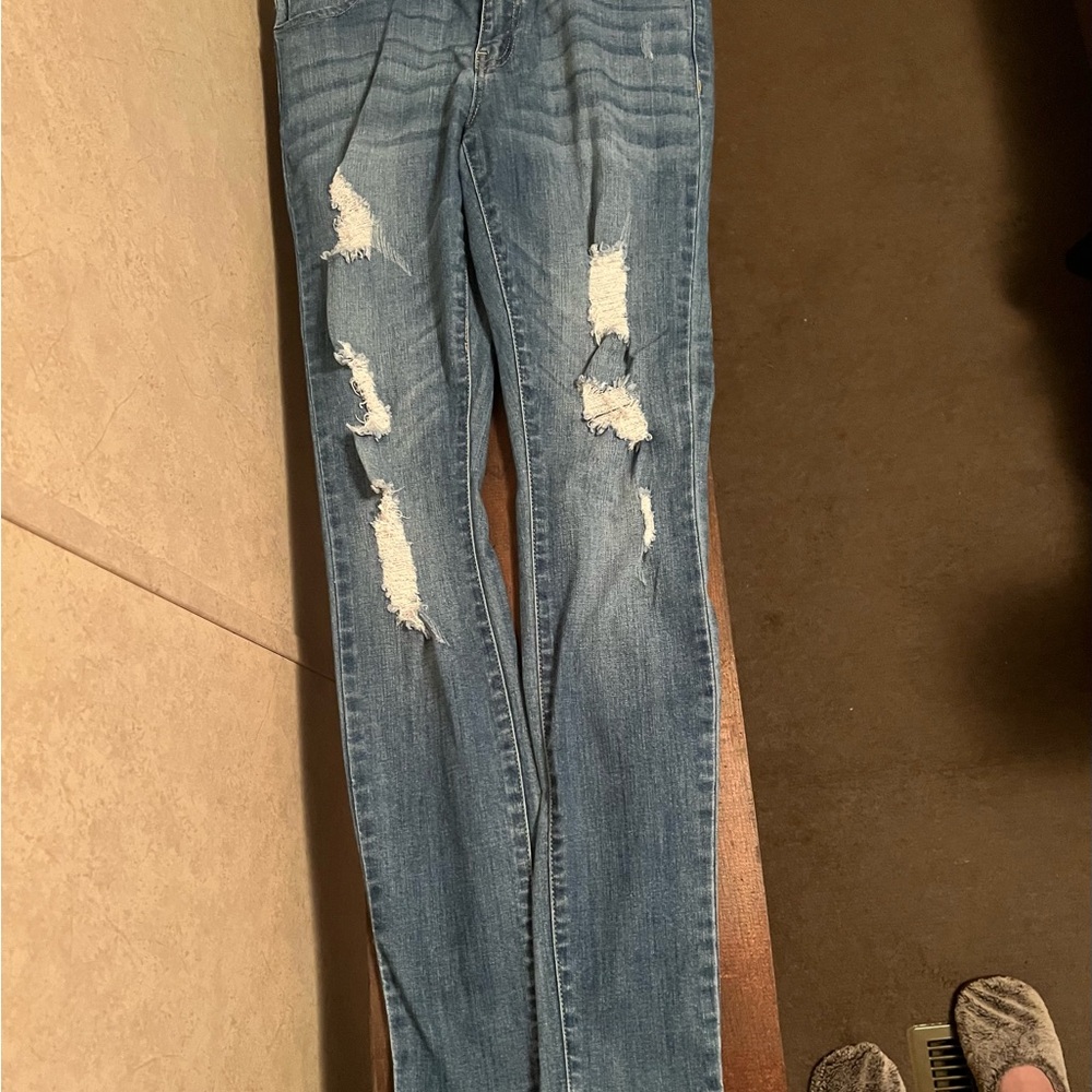 Distressed Blue Jeans